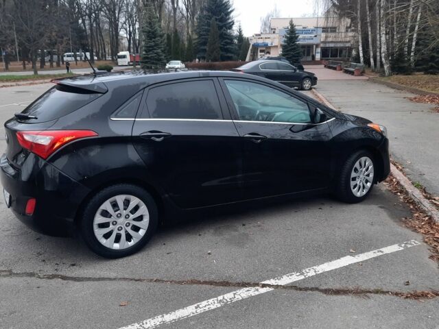 Чорний Хендай Елантра, об'ємом двигуна 2 л та пробігом 135 тис. км за 9100 $, фото 4 на Automoto.ua