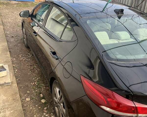 Черный Хендай Элантра, объемом двигателя 2 л и пробегом 95 тыс. км за 13500 $, фото 2 на Automoto.ua