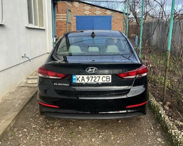 Черный Хендай Элантра, объемом двигателя 2 л и пробегом 95 тыс. км за 13500 $, фото 1 на Automoto.ua