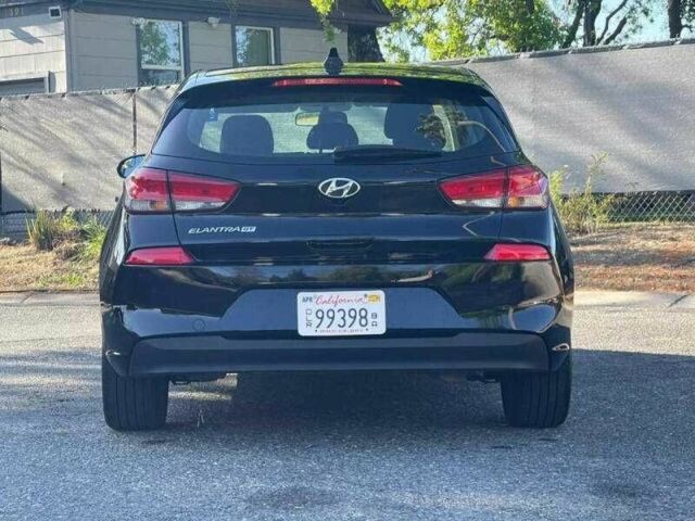 Черный Хендай Элантра, объемом двигателя 2 л и пробегом 67 тыс. км за 3100 $, фото 4 на Automoto.ua