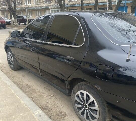 Черный Хендай Элантра, объемом двигателя 1.8 л и пробегом 400 тыс. км за 1500 $, фото 2 на Automoto.ua