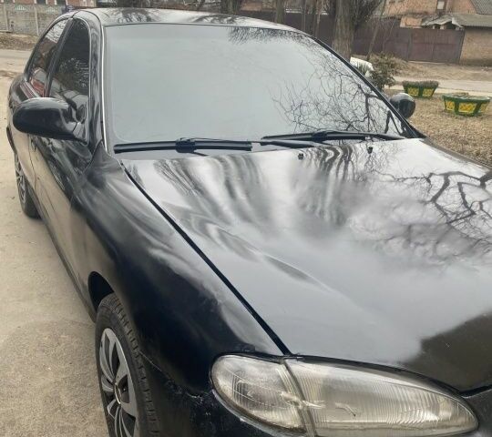 Черный Хендай Элантра, объемом двигателя 1.8 л и пробегом 400 тыс. км за 1500 $, фото 3 на Automoto.ua