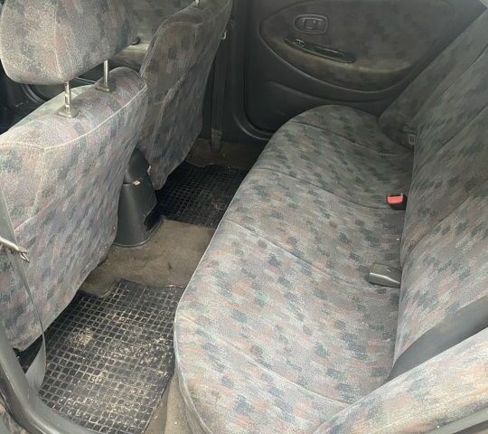 Черный Хендай Элантра, объемом двигателя 1.8 л и пробегом 400 тыс. км за 1500 $, фото 5 на Automoto.ua