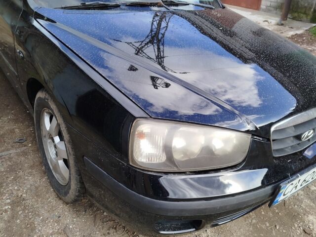 Черный Хендай Элантра, объемом двигателя 2 л и пробегом 280 тыс. км за 3000 $, фото 1 на Automoto.ua