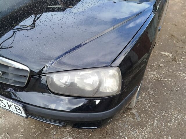 Черный Хендай Элантра, объемом двигателя 2 л и пробегом 280 тыс. км за 3000 $, фото 6 на Automoto.ua