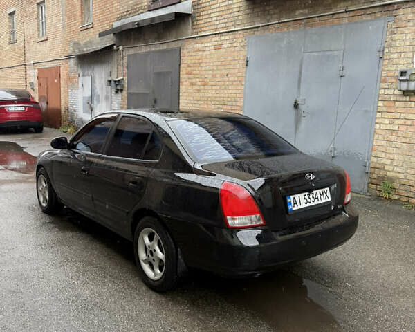 Черный Хендай Элантра, объемом двигателя 2 л и пробегом 283 тыс. км за 3500 $, фото 1 на Automoto.ua