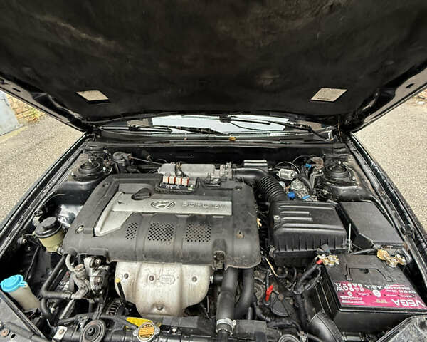 Черный Хендай Элантра, объемом двигателя 2 л и пробегом 283 тыс. км за 3500 $, фото 4 на Automoto.ua