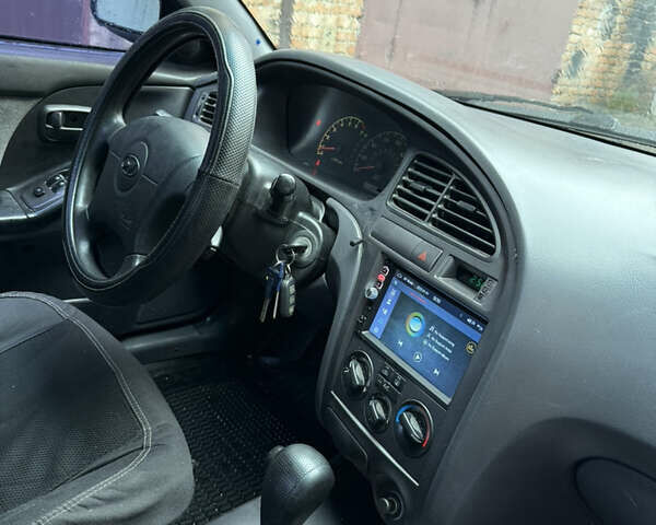 Черный Хендай Элантра, объемом двигателя 2 л и пробегом 283 тыс. км за 3500 $, фото 5 на Automoto.ua