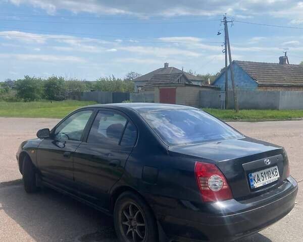 Черный Хендай Элантра, объемом двигателя 1.6 л и пробегом 295 тыс. км за 2750 $, фото 3 на Automoto.ua