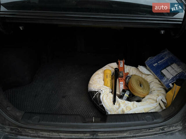 Черный Хендай Элантра, объемом двигателя 1.59 л и пробегом 264 тыс. км за 5800 $, фото 24 на Automoto.ua