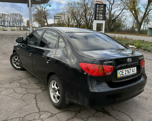 Черный Хендай Элантра, объемом двигателя 1.59 л и пробегом 264 тыс. км за 5800 $, фото 6 на Automoto.ua