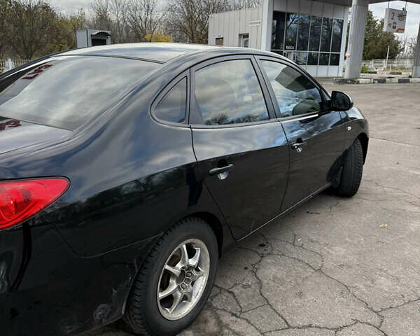 Черный Хендай Элантра, объемом двигателя 1.59 л и пробегом 264 тыс. км за 5800 $, фото 10 на Automoto.ua