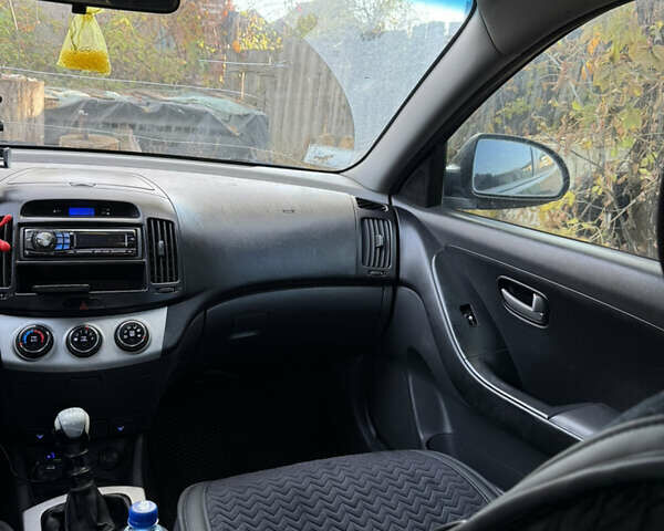 Черный Хендай Элантра, объемом двигателя 1.59 л и пробегом 264 тыс. км за 5800 $, фото 17 на Automoto.ua