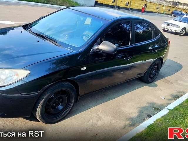 Черный Хендай Элантра, объемом двигателя 1.6 л и пробегом 253 тыс. км за 5100 $, фото 2 на Automoto.ua