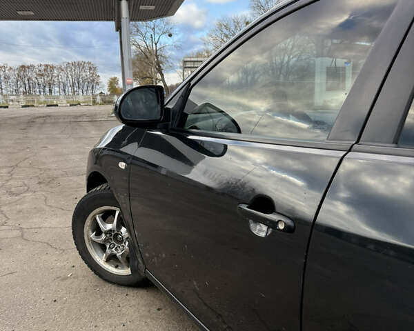 Черный Хендай Элантра, объемом двигателя 1.59 л и пробегом 264 тыс. км за 5800 $, фото 4 на Automoto.ua