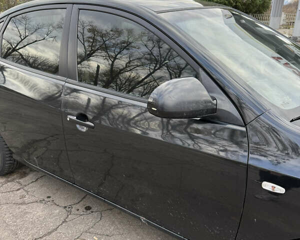 Черный Хендай Элантра, объемом двигателя 1.59 л и пробегом 264 тыс. км за 5800 $, фото 11 на Automoto.ua