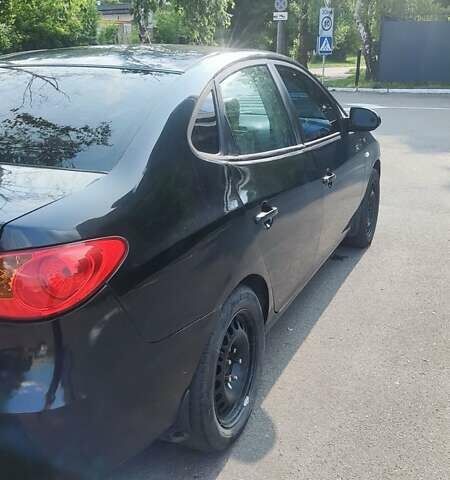 Черный Хендай Элантра, объемом двигателя 1.59 л и пробегом 280 тыс. км за 4500 $, фото 4 на Automoto.ua