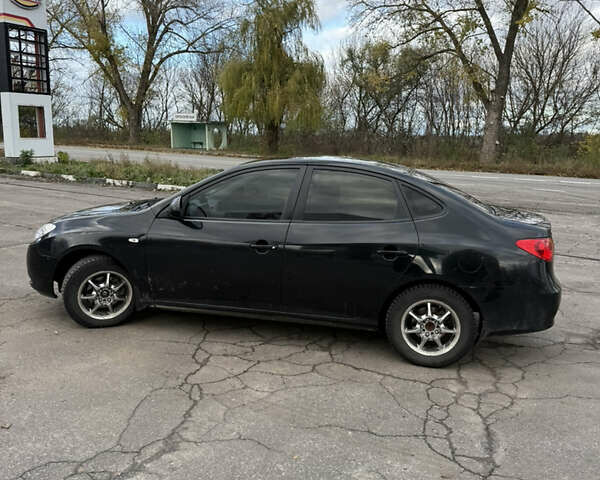 Черный Хендай Элантра, объемом двигателя 1.59 л и пробегом 264 тыс. км за 5800 $, фото 5 на Automoto.ua