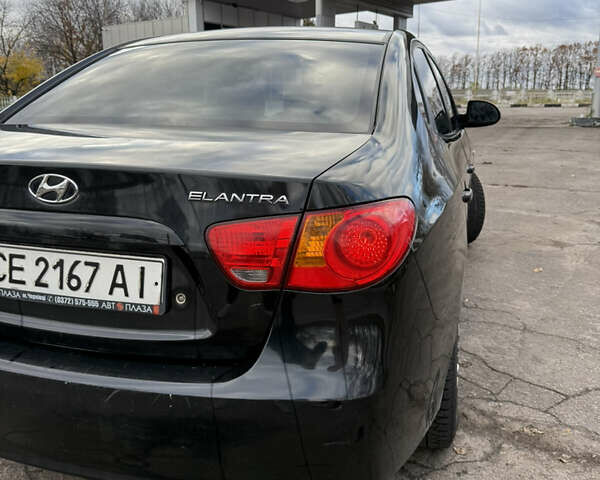Черный Хендай Элантра, объемом двигателя 1.59 л и пробегом 264 тыс. км за 5800 $, фото 8 на Automoto.ua