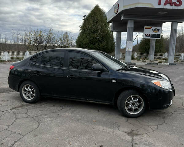 Черный Хендай Элантра, объемом двигателя 1.59 л и пробегом 264 тыс. км за 5800 $, фото 12 на Automoto.ua