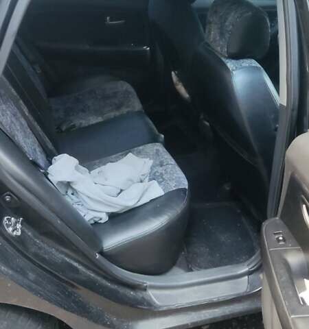 Черный Хендай Элантра, объемом двигателя 1.59 л и пробегом 280 тыс. км за 4500 $, фото 1 на Automoto.ua