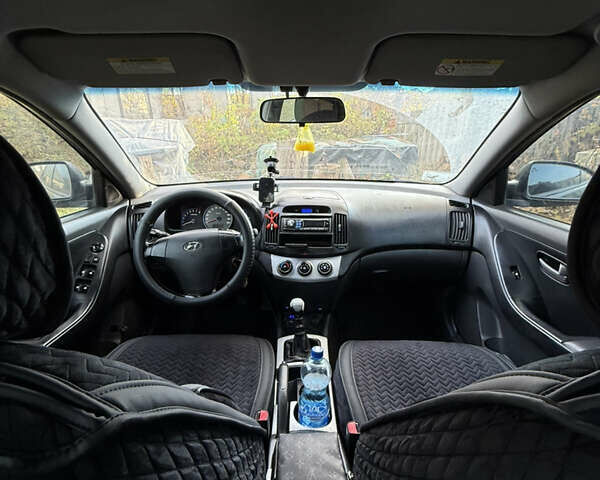 Черный Хендай Элантра, объемом двигателя 1.59 л и пробегом 264 тыс. км за 5800 $, фото 19 на Automoto.ua