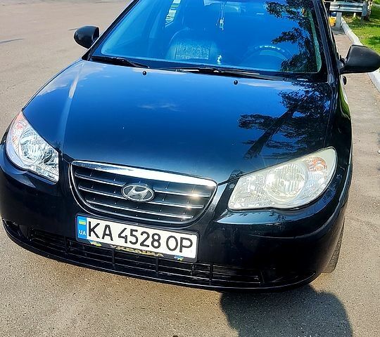 Черный Хендай Элантра, объемом двигателя 1.6 л и пробегом 253 тыс. км за 5100 $, фото 3 на Automoto.ua