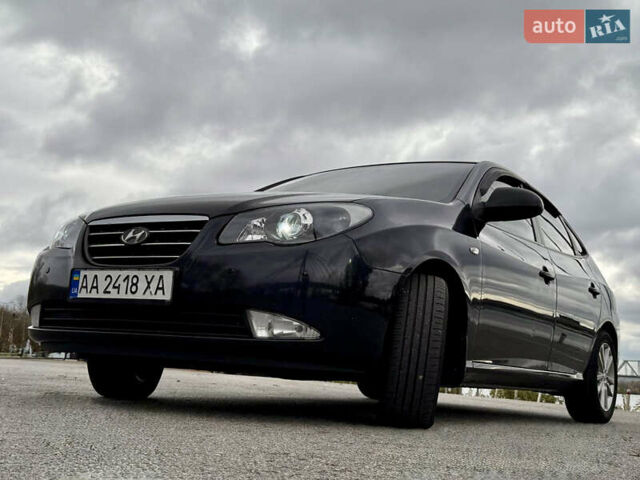 Чорний Хендай Елантра, об'ємом двигуна 2 л та пробігом 240 тис. км за 7850 $, фото 9 на Automoto.ua