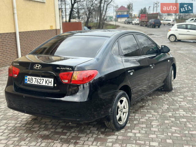 Черный Хендай Элантра, объемом двигателя 1.59 л и пробегом 242 тыс. км за 5999 $, фото 7 на Automoto.ua