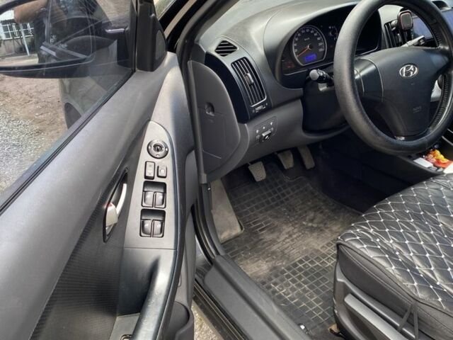 Черный Хендай Элантра, объемом двигателя 1.6 л и пробегом 163 тыс. км за 6700 $, фото 10 на Automoto.ua