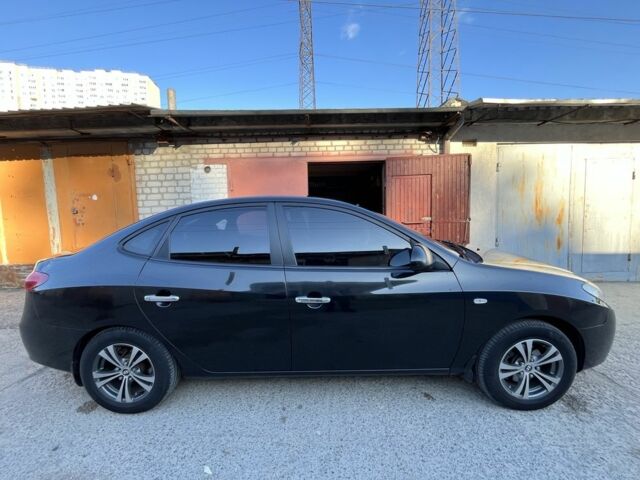 Черный Хендай Элантра, объемом двигателя 1.6 л и пробегом 240 тыс. км за 6411 $, фото 5 на Automoto.ua