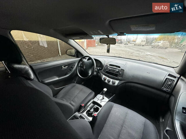 Черный Хендай Элантра, объемом двигателя 1.59 л и пробегом 242 тыс. км за 5999 $, фото 9 на Automoto.ua