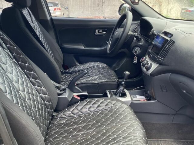 Черный Хендай Элантра, объемом двигателя 1.6 л и пробегом 163 тыс. км за 6700 $, фото 11 на Automoto.ua