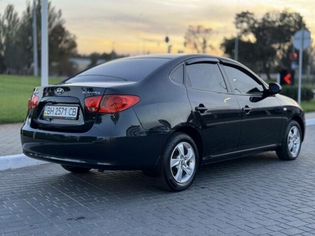 Черный Хендай Элантра, объемом двигателя 1.6 л и пробегом 150 тыс. км за 6500 $, фото 4 на Automoto.ua