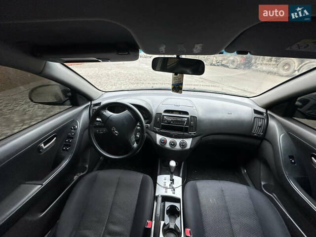 Черный Хендай Элантра, объемом двигателя 1.59 л и пробегом 242 тыс. км за 5999 $, фото 10 на Automoto.ua