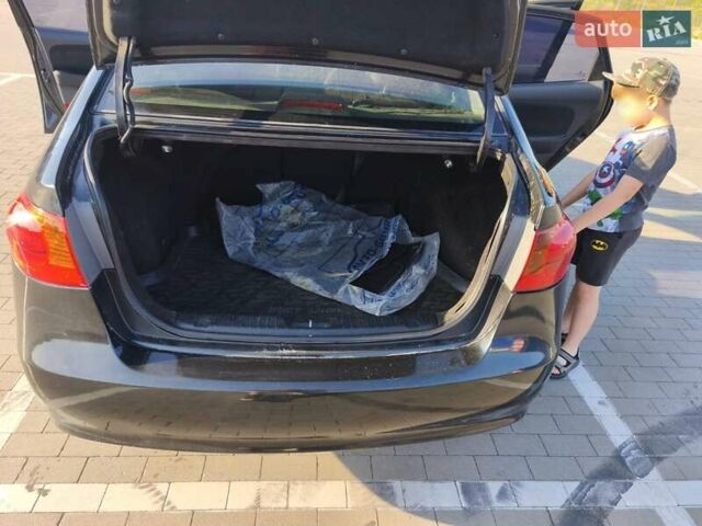 Черный Хендай Элантра, объемом двигателя 1.59 л и пробегом 213 тыс. км за 5300 $, фото 8 на Automoto.ua