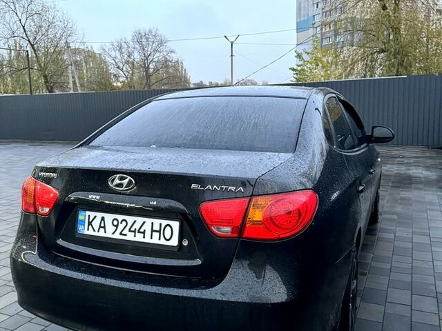 Черный Хендай Элантра, объемом двигателя 1.6 л и пробегом 261 тыс. км за 4799 $, фото 5 на Automoto.ua