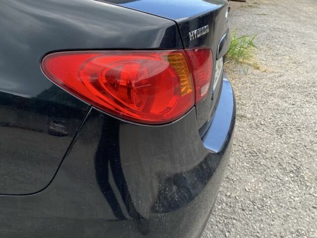 Черный Хендай Элантра, объемом двигателя 1.6 л и пробегом 163 тыс. км за 6700 $, фото 5 на Automoto.ua