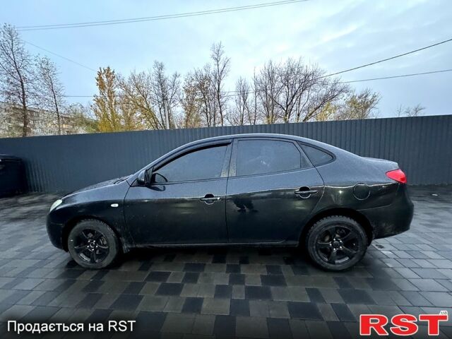 Черный Хендай Элантра, объемом двигателя 1.6 л и пробегом 261 тыс. км за 4799 $, фото 2 на Automoto.ua