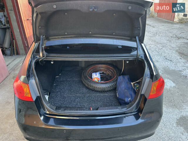 Черный Хендай Элантра, объемом двигателя 1.59 л и пробегом 240 тыс. км за 6257 $, фото 10 на Automoto.ua