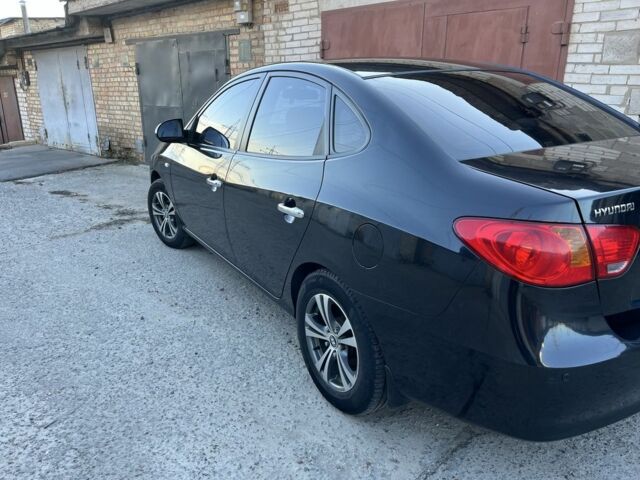 Черный Хендай Элантра, объемом двигателя 1.6 л и пробегом 240 тыс. км за 6411 $, фото 3 на Automoto.ua