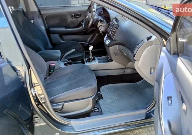 Черный Хендай Элантра, объемом двигателя 1.59 л и пробегом 184 тыс. км за 4975 $, фото 8 на Automoto.ua