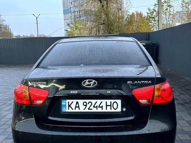 Черный Хендай Элантра, объемом двигателя 1.6 л и пробегом 261 тыс. км за 4799 $, фото 4 на Automoto.ua