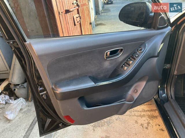 Черный Хендай Элантра, объемом двигателя 1.59 л и пробегом 240 тыс. км за 6257 $, фото 21 на Automoto.ua