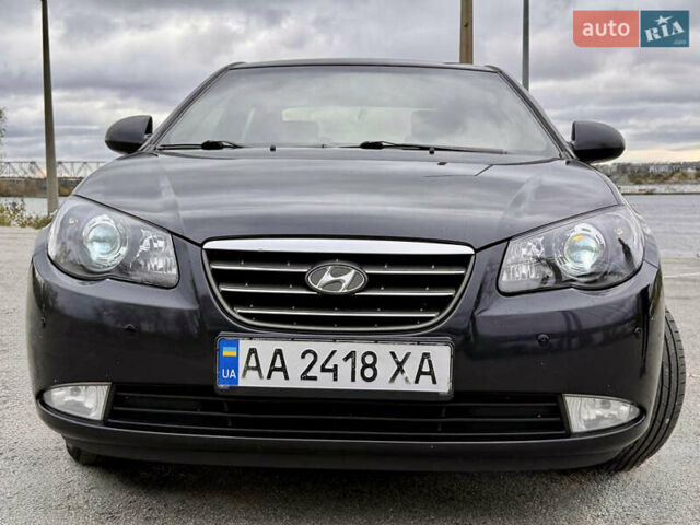 Чорний Хендай Елантра, об'ємом двигуна 2 л та пробігом 240 тис. км за 7850 $, фото 10 на Automoto.ua
