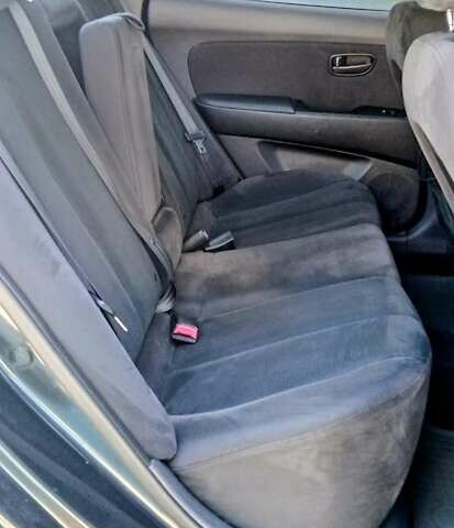 Черный Хендай Элантра, объемом двигателя 1.59 л и пробегом 184 тыс. км за 4975 $, фото 6 на Automoto.ua