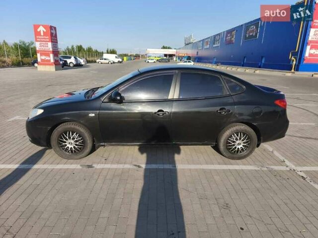 Черный Хендай Элантра, объемом двигателя 1.59 л и пробегом 213 тыс. км за 5300 $, фото 9 на Automoto.ua