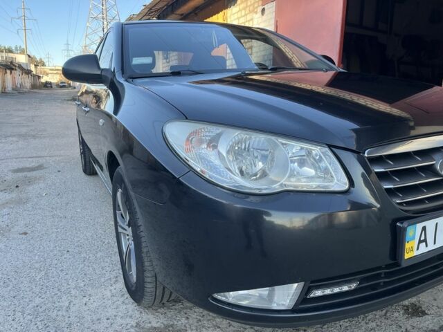 Черный Хендай Элантра, объемом двигателя 1.6 л и пробегом 240 тыс. км за 6411 $, фото 1 на Automoto.ua