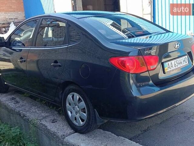 Черный Хендай Элантра, объемом двигателя 1.59 л и пробегом 184 тыс. км за 4975 $, фото 3 на Automoto.ua