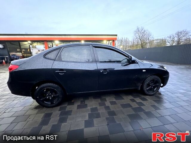 Черный Хендай Элантра, объемом двигателя 1.6 л и пробегом 261 тыс. км за 4799 $, фото 6 на Automoto.ua